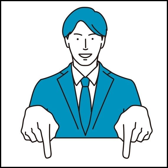 両手で下に指を刺す男性